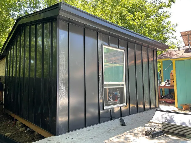 Black standing seam metal wall panels for Roof Inspection in Watauga