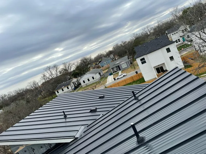 Standing seam metal roof panels with vents for Skylight Repair in Watauga
